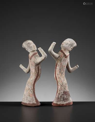 A PAIR OF PAINTED POTTERY FIGURES OF DANCERS, HAN