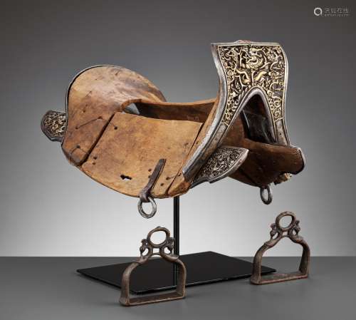 A PARCEL-GILT IRON AND WOOD SADDLE, YONGLE PERIOD