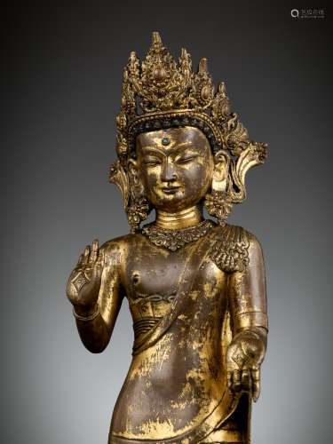 A RARE GILT BRONZE FIGURE OF DIPANKARA, MALLA