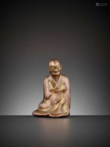 A GILT COPPER ALLOY FIGURE OF A LUOHAN, 17TH C.