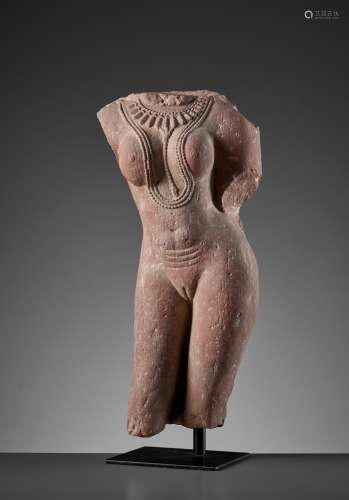 A RED SANDSTONE TORSO OF A LADY, 10TH CENTURY