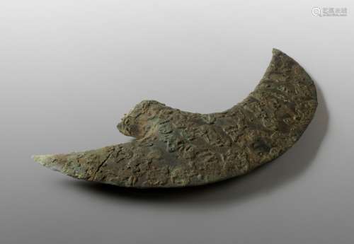 A VERY LARGE CRESCENT-SHAPED BRONZE AXE, DONG SON