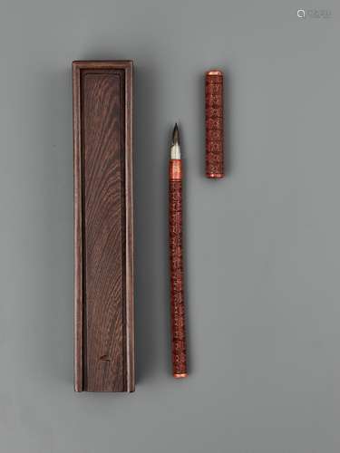 A CARVED RED LACQUER BRUSH AND COVER, LATE MING