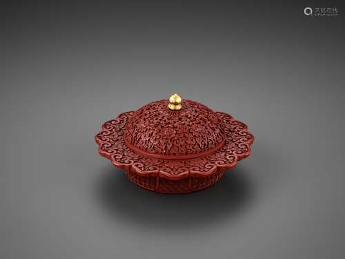 A CARVED CINNABAR LACQUER ZHADOU AND COVER, QI…