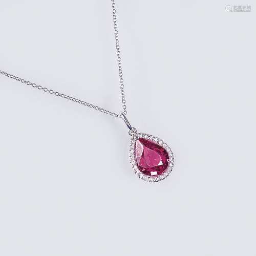 A Pink Sapphire Pendant on Necklace.