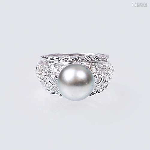 A Diamond Ring with Tahiti Pearl.