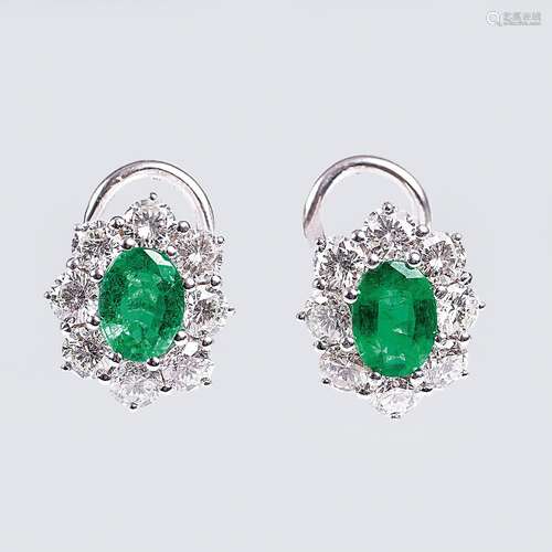 A Pair of Emerald Diamond Earrings.