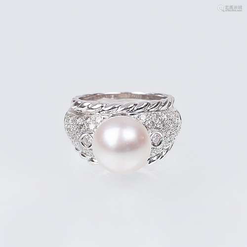 A Diamond Ring with Pearl.