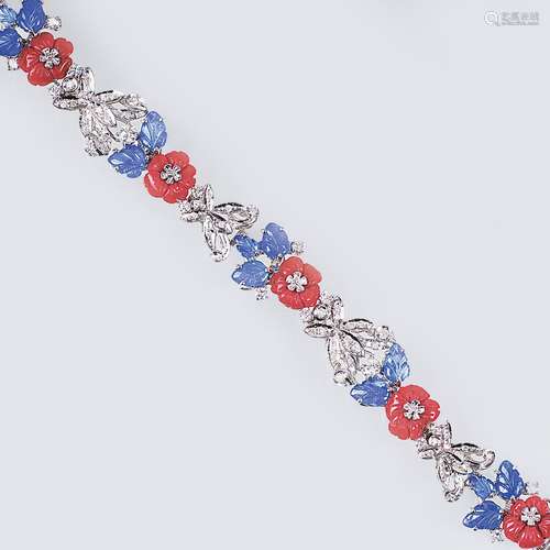 A Sapphire Diamond Bracelet with Coral Flowers.