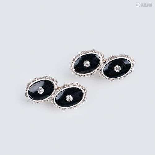 A Pair of Art Nouveau Cufflinks with Onyx and Diamonds.