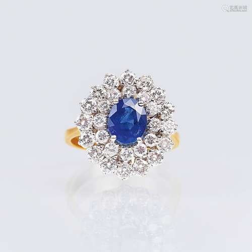 A very fine Diamond Ring with natural Sapphire.