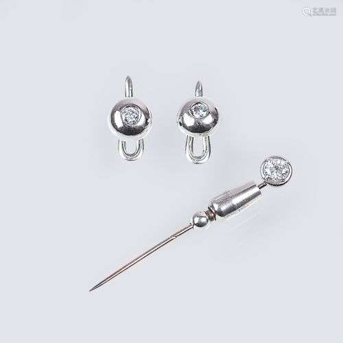 A Pair of Tailcoat Buttons and Needle with Diamonds.