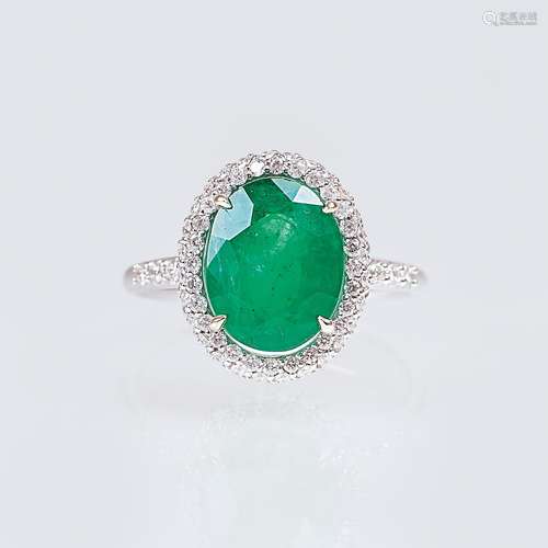 An Emerald Diamond Ring.