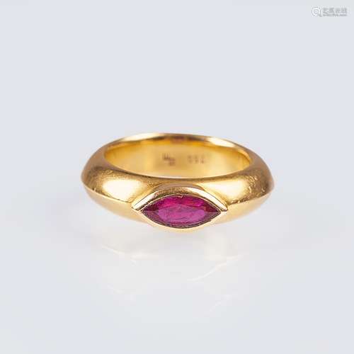 A Gold Ring with Ruby.