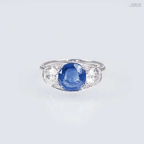 An Art-déco diamond ring with natural Sapphire.