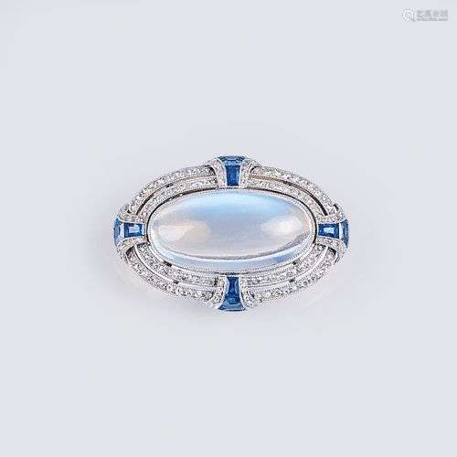 An Art-déco Moonstone Sapphire Diamond Brooch.