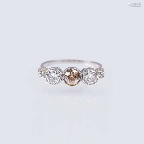 An Art Nouveau Diamond Ring with Fancy Diamond.