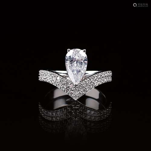 A White Pear-Cut Diamond Ring with Diamonds.