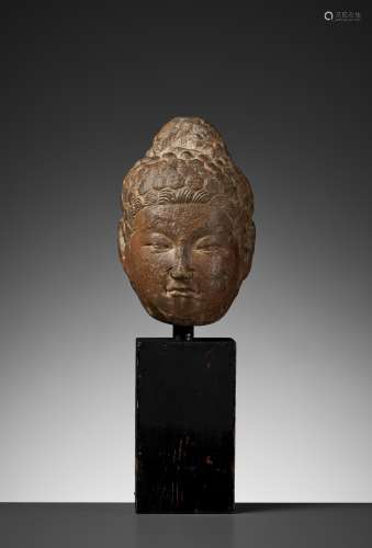 A LIMESTONE HEAD OF BUDDHA, NORTHERN QI TO TANG
