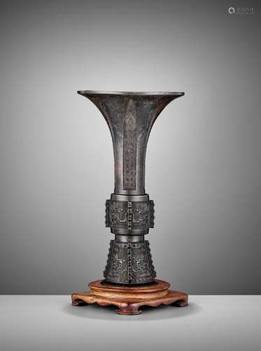 AN ARCHAISTIC BRONZE BEAKER VASE, GU, 17TH C.