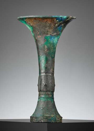 AN ARCHAIC BRONZE RITUAL WINE VESSEL, GU, SHANG