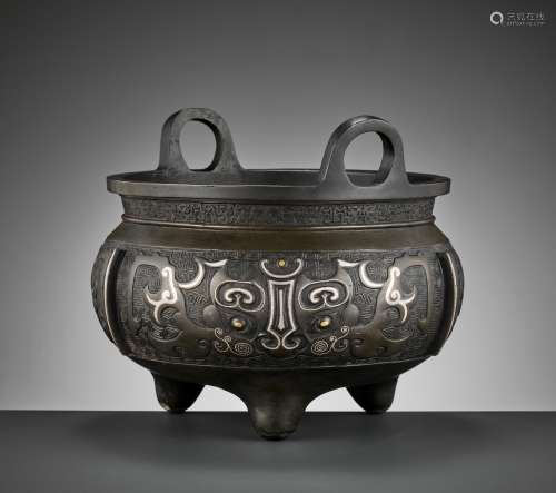 A SILVER-INLAID BRONZE TRIPOD CENSER, MING-QING