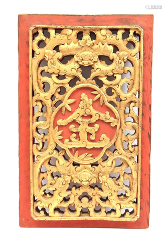 Richly carved wooden wall ornament