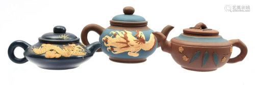 3 earthenware Yixing tea pots with blue decor