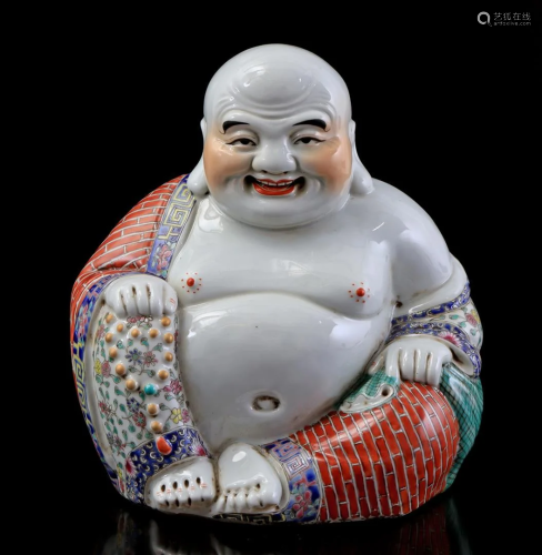 Porcelain statue of a seated Buddha