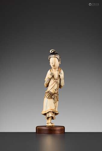 AN IVORY FIGURE OF A LAN CAIHE, MING DYNASTY