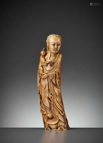 AN IVORY FIGURE OF GUANYIN AND CHILD, LATE MING DYNASTY