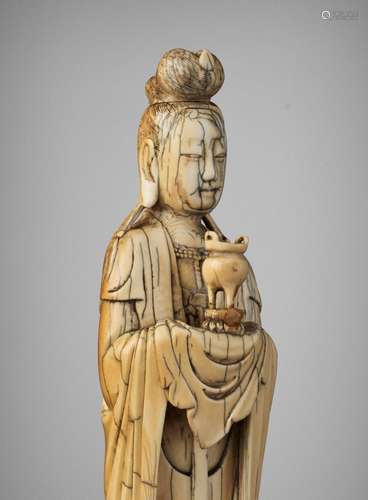 AN IVORY FIGURE OF A LADY HOLDING A CENSER, LATE MING DYNAST...