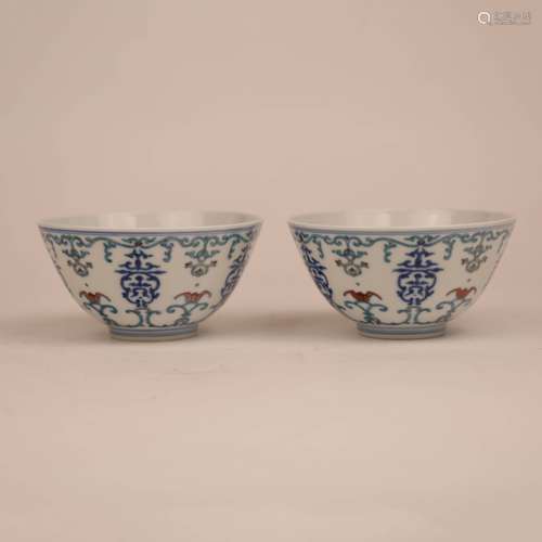 A pair of colorful pattern bowls