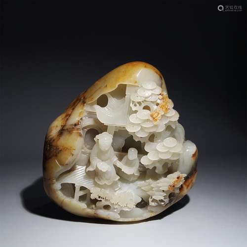 A HETIAN JADE PEBBLE FIGURE ROCKERY