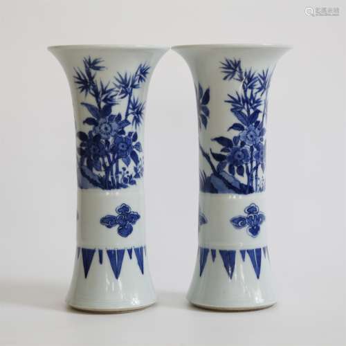 A PAIR OF BLUE AND WHITE FLOWER VASES