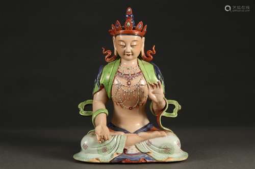 A FAMILLE ROSE KWAN-YIN STATUE