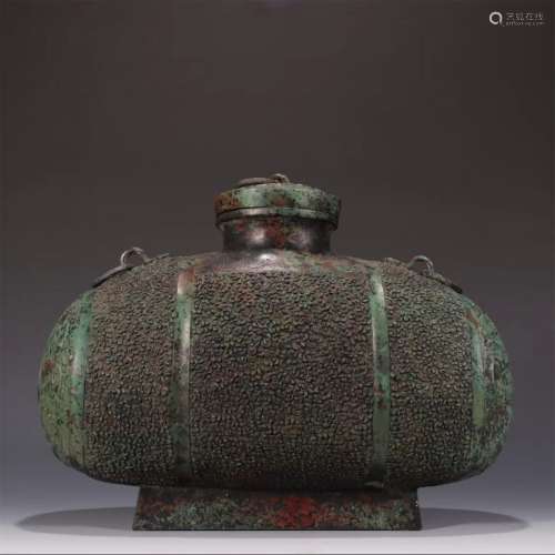 A SHANG DYNASTY BRONZE BEAST EARS BOTTLE WITH LID