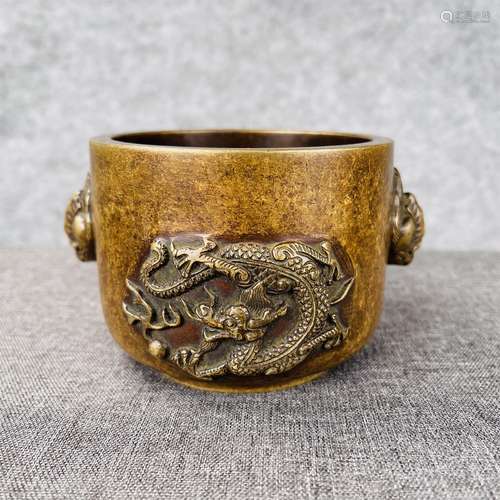 A MING DYNASTY XUANDE CHICKEN EAR DRAGON GRAIN DRUM TYPE BUR...