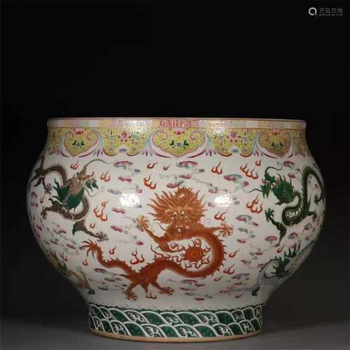 A QING DYNASTY QIANLONG STYLE FAMILLE ROSE DRAGON GRAIN JAR