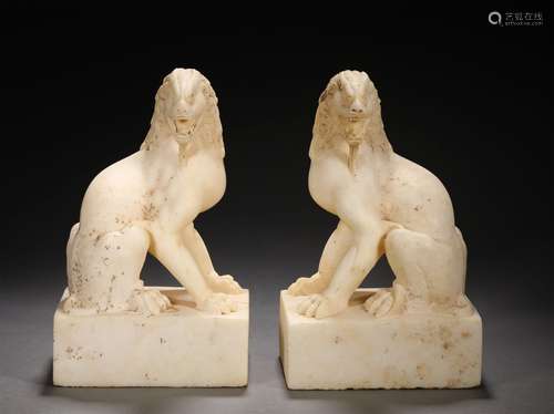 A PAIR OF TANG DYNASTY WHITE MARBLE LIONS