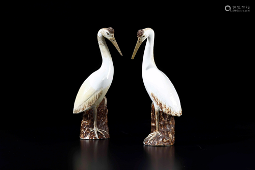 Two enamelled porcelain herons, China, 1800s, Two