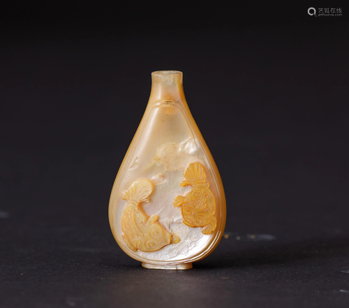 A mother-of-pearl snuff bottle, China, A