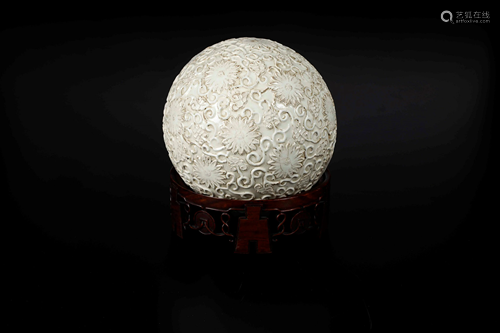 A Blanc de Chine sphere, China, Qing Dynasty, A Blanc