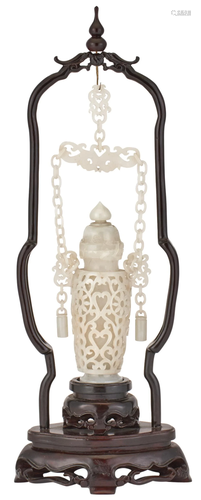 A Chinese White Jade Hanging Revolving Vase and Cover