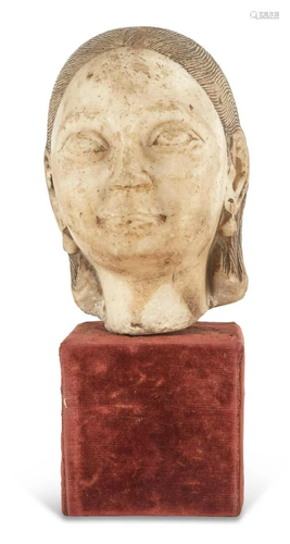 An Egyptian or Near Eastern Carved Marble Head of a