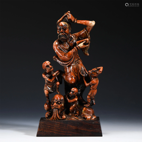 A SOAPSTONE CARVED FIGURAL DECORATION