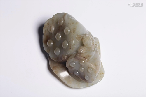 A WHITE JADE CARVING OF LOTUS SEEDPODS