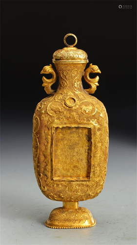 A GILT BRONZE VASE WITH DOUBLE HANDLES