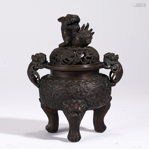 A BRONZE TRIPOD INCENSE BURNER WITH BEAST HANDLES