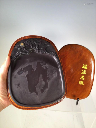 AN INCISED FLOWER-BIRD INK-STONE WITH HARDWOOD BOX